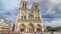 Front view of Notre-Dame de Paris timelapse hyperlapse, a medieval Catholic cathedral on the Cite Island in Paris Royalty Free Stock Photo