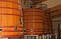 Four oak, bulk holding tanks barrel of red wine in Spain