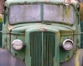 Front view of an old abandoned green rusty 1940s truck Royalty Free Stock Photo