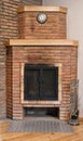 Old brick fireplace with black doors Royalty Free Stock Photo