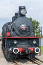 Front view of an old-fashioned steam locomotive. Royalty Free Stock Photo