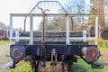 Front view of old flatcar with coupling stops or bumper on disused tracks Royalty Free Stock Photo