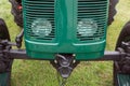 Front view of an old green tractor Royalty Free Stock Photo