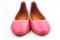 Front view of an old pair of pink casual shoe Royalty Free Stock Photo