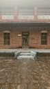 front view of an old palace made of red brick stones Royalty Free Stock Photo