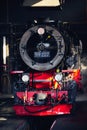 Front view of an old red and black locomotive train Royalty Free Stock Photo