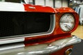 Front view of a old retro car. Car exterior details. Headlight of a vintage retro car. The front lights of the car. Royalty Free Stock Photo