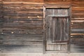 Front view: old rustic wooden wall and door Royalty Free Stock Photo