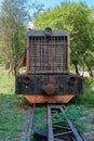 Front view of an old rusty broken diesel locomotive