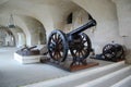 Front view of old vintage metal cannon in historical museum Royalty Free Stock Photo