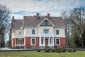 Front View of Olustvere manor in spring. Royalty Free Stock Photo