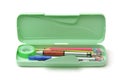 Open plastic pencil box with different supplies