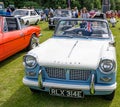 Close up of classic Triumph sports car on display at a public car show