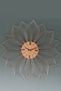 Front view orange and black wall clock on the green wall background, decoration ,object, copy space