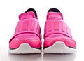 Front view of a pair of pink lady sport shoes