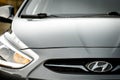Front view of part Hyundai solaris in grey color, classic sedan.