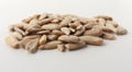 Front view of a pile of natural shelled organic sunflower seeds isolated on white background. Royalty Free Stock Photo