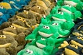 Front view piled toy frogs