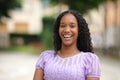 Black woman with perfect teeth laughing at camera Royalty Free Stock Photo