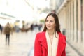 Beautiful serious woman walking in winter Royalty Free Stock Photo