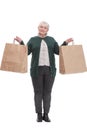 Front view portrait of pretty mature lady carrying shopping bags Royalty Free Stock Photo