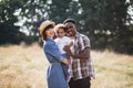 Multi ethnic family of three spending time on nature Royalty Free Stock Photo