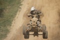 Front view of quad racer jumping Royalty Free Stock Photo