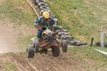 Front view of quad rider jumping in the race Royalty Free Stock Photo