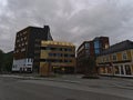 Front view of Quality Saga Hotel in the center of TromsÃÂ¸ with striking facade in golden color in the evening.