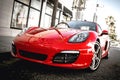 Red Porsche Boxster on the street in Beverly Hills.