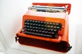 Front view of red vintage Olivetti Valentine typewriter