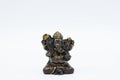 An ornate statue of ganesh / ganesha statue on an isolated white background