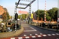 Front view of a road over a bridge of a little canal in amsterdam netherland