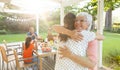 Family eating outside together in summer Royalty Free Stock Photo