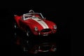 Front view of Shelby Cobra 427 Toy model car on a black background Royalty Free Stock Photo