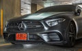 Front view shot of Matte black mercedes sports car parked in the parking lot