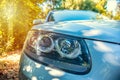Front view of a silver SUV parked in a driveway Royalty Free Stock Photo