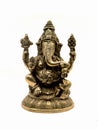 front view of sitting ganesh with four hands, brass statue Royalty Free Stock Photo