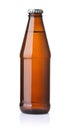 Front view of small brown unlabeled glass beer bottle Royalty Free Stock Photo