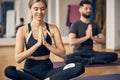 Blonde woman and a man meditating with their eyes closed Royalty Free Stock Photo