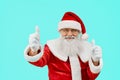 Smiling Santa Claus showing thumbs up. Royalty Free Stock Photo
