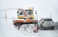 Front view of snowplow service truck at work