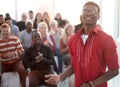 Front view of speaker at an international business seminar Royalty Free Stock Photo