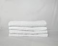 Front view stacked white towels