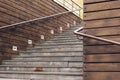 front view of stone stair way. Empty staircase outdoor and wooden panel wall background Royalty Free Stock Photo