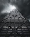 Front view of a huge skyscraper with dramatic weather