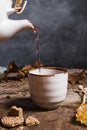 Front view tea being poured cup. High quality and resolution beautiful photo concept Royalty Free Stock Photo