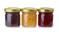 Front view of three different jam jars Royalty Free Stock Photo