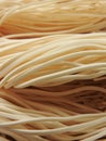 Front view of three layer of raw thin noodles full of frame. Food ingredients. Asian, Taiwanese cuisine ingredients.