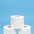 front view three stacked toilet paper rolls with copy space. High quality photo Royalty Free Stock Photo